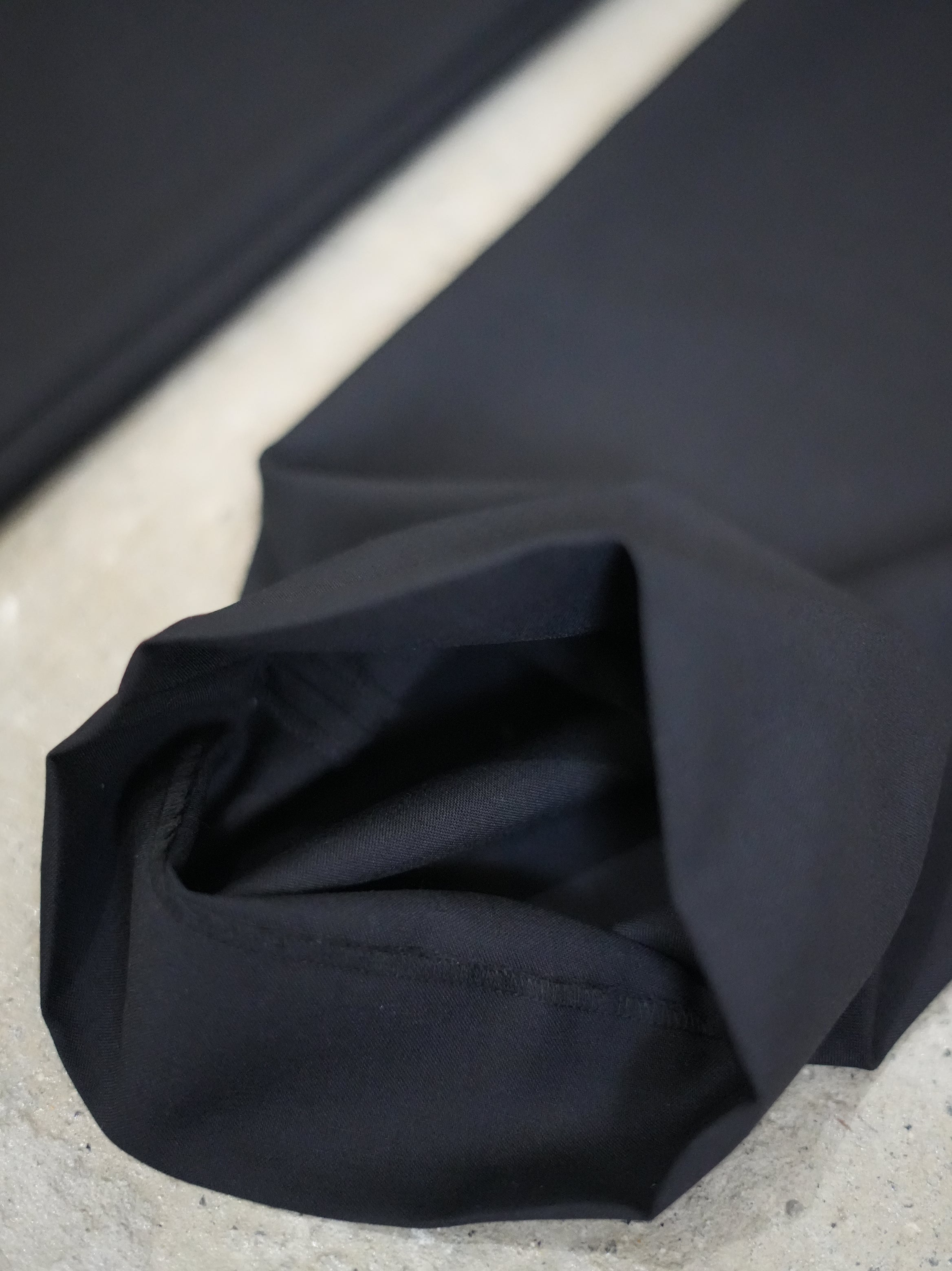 mando (マンド) wool mohair 2-tuck semi-wide pants