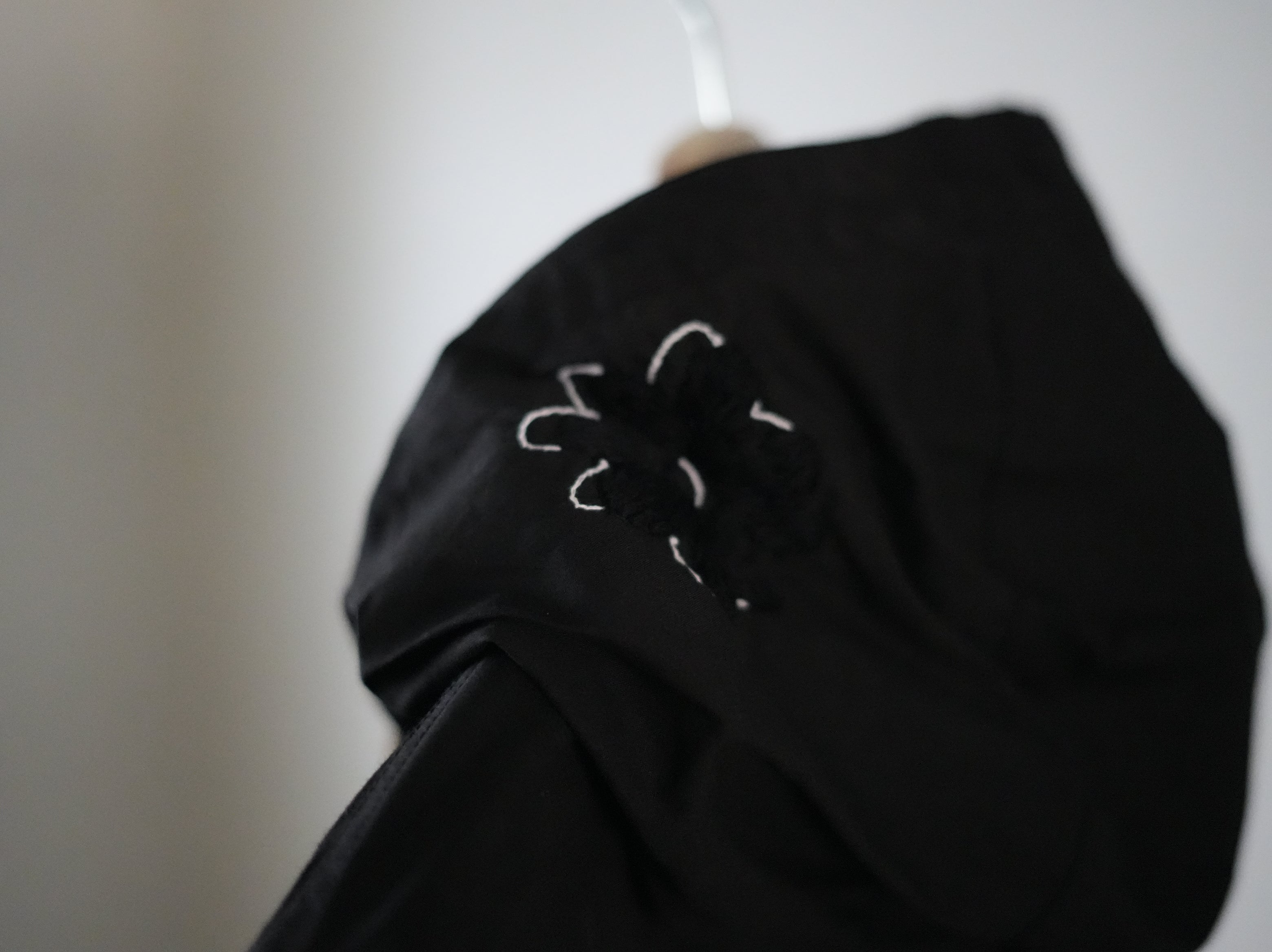 NOMA RHYTHM TEXTILE (ノーマ) / FLOWER EMBROIDERY HOODED COAT black